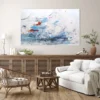 Originalgemälde "Segel setzen" über einem rustikalen Holzsideboard im gemütlichen Wohnzimmer im Skandi-Stil.