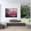„Füreinander Nr. 4" – abstrakte Acrylgemälde für Wohnzimmer kaufen Abstraktes Acrylbild „Füreinander Nr. 4" an weißer Wand über grauem Sofa in modernem Wohnzimmer mit Gartenblick