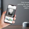 Smartphone zeigt Vorschau eines Gemäldes von Katja Gramann an der Wand mit der kostenlosen IAZZU-Augmented-Reality-App