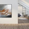 Quadratisches Gemälde „Neubeginn Nr. 4" an heller Wand in lichtdurchflutetem Loft-Wohnraum mit Dachschräge